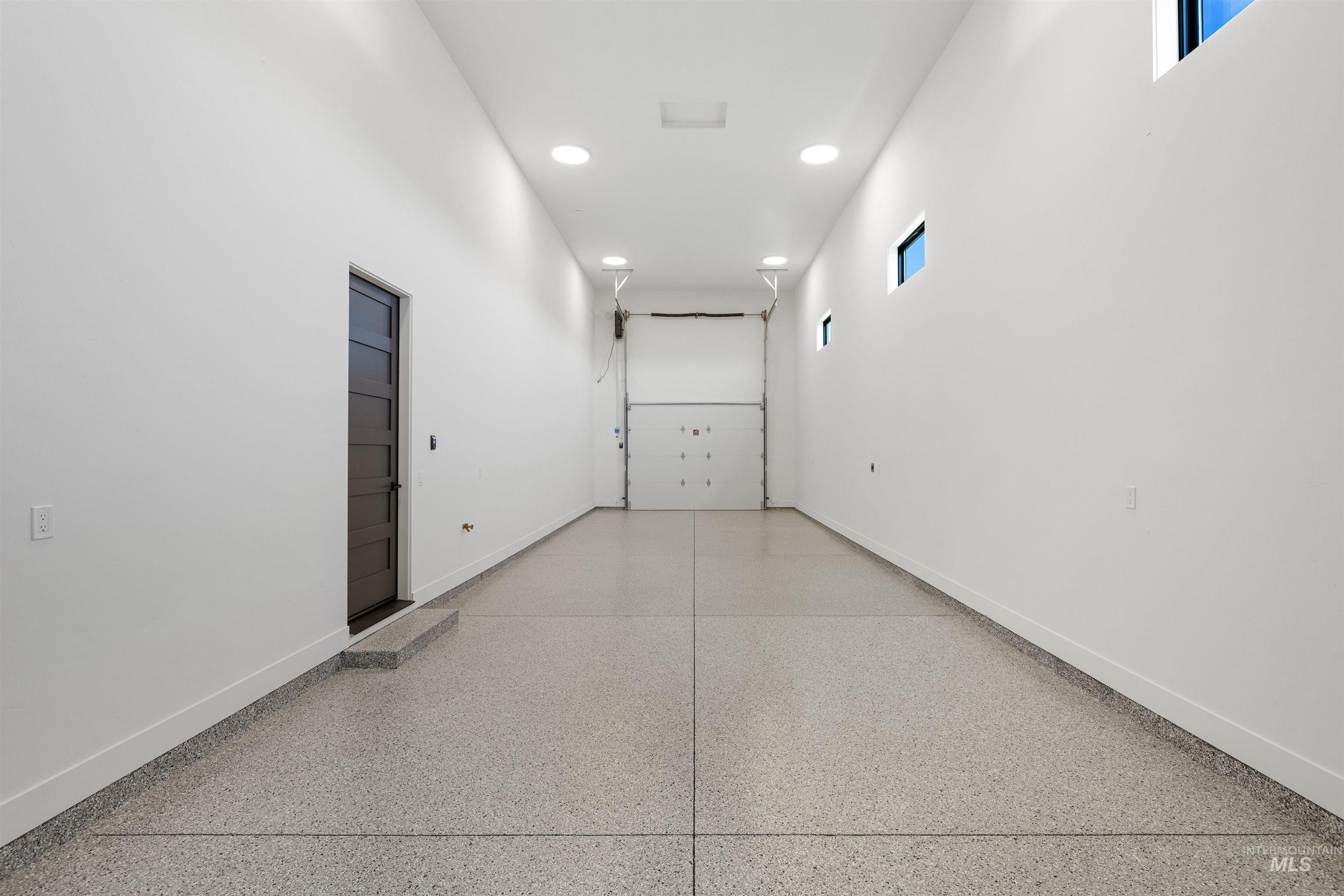 25403 Bur Oak Place Caldwell, ID 83607 - Photo 37 of 46 Corridor with recessed lighting and dark speckled floor
