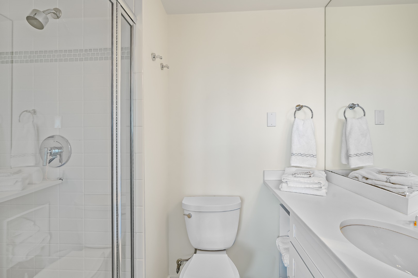 493 Katama Road, Unit E2 Edgartown, MA 02539 - Photo 12 of 29 a bathroom with a sink a toilet and shower