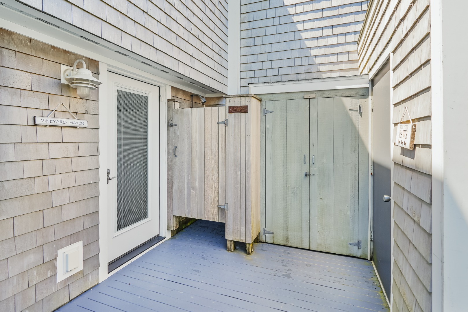 493 Katama Road, Unit E2 Edgartown, MA 02539 - Photo 20 of 29 a view of a entryway with wooden floor and stairs