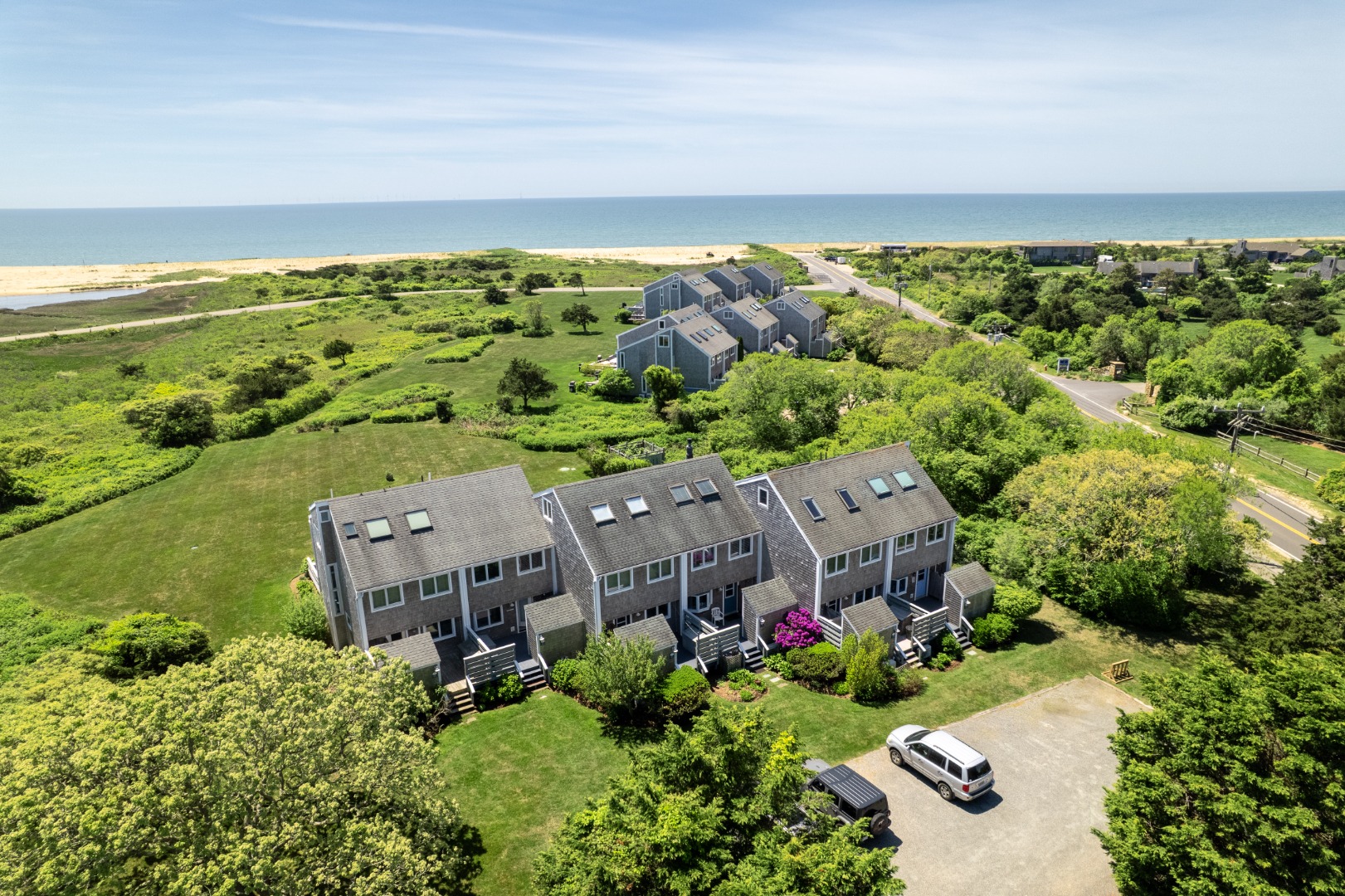 493 Katama Road, Unit E2 Edgartown, MA 02539 - Photo 24 of 29 an aerial view of a house with a garden