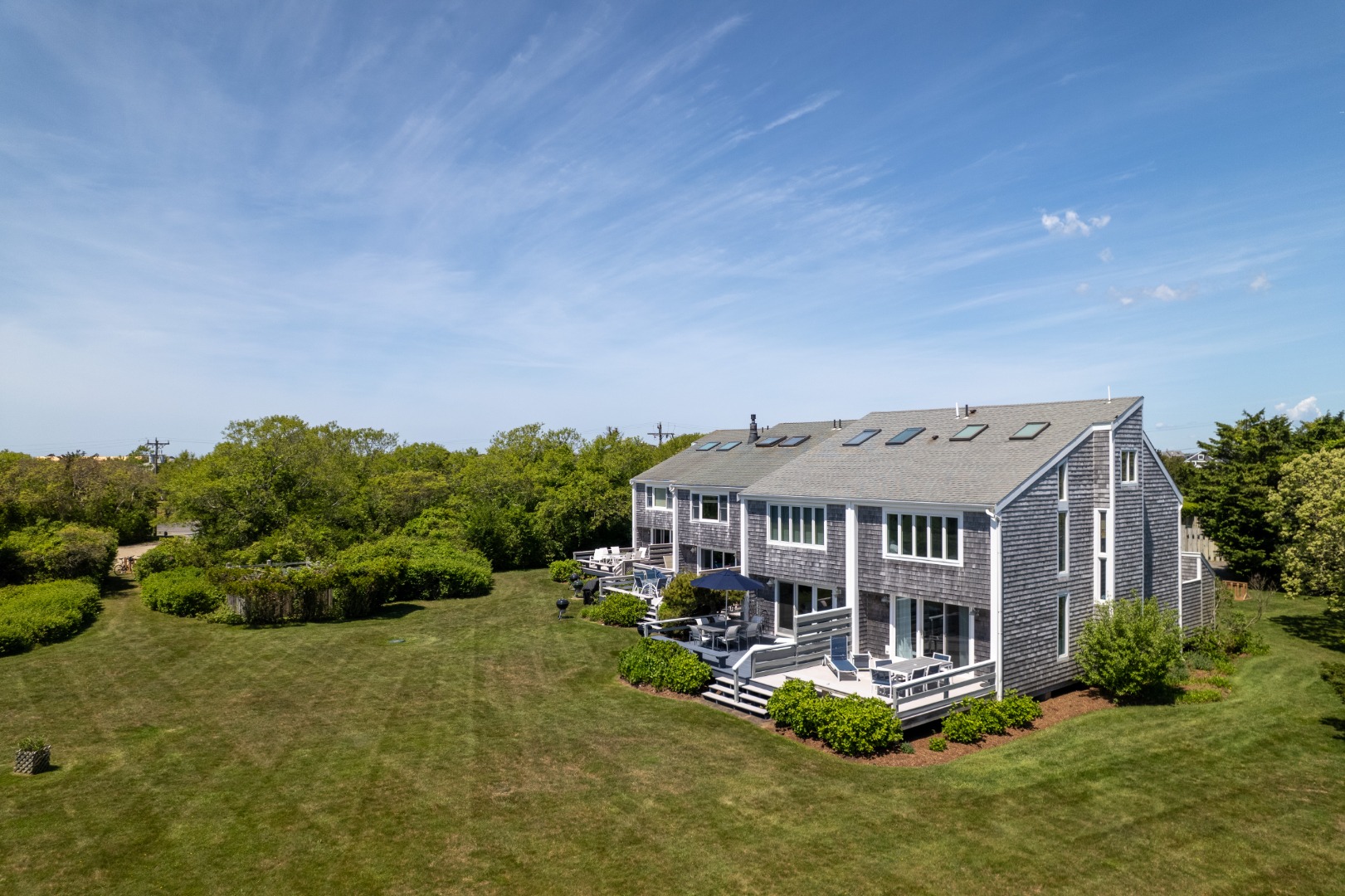 493 Katama Road, Unit E2 Edgartown, MA 02539 - Photo 29 of 29 an aerial view of a house with swimming pool and a yard