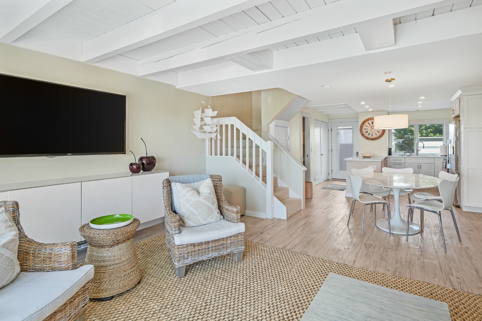 493 Katama Road, Unit E2 Edgartown, MA 02539 - Photo 5 of 29 a living room with furniture and a flat screen tv