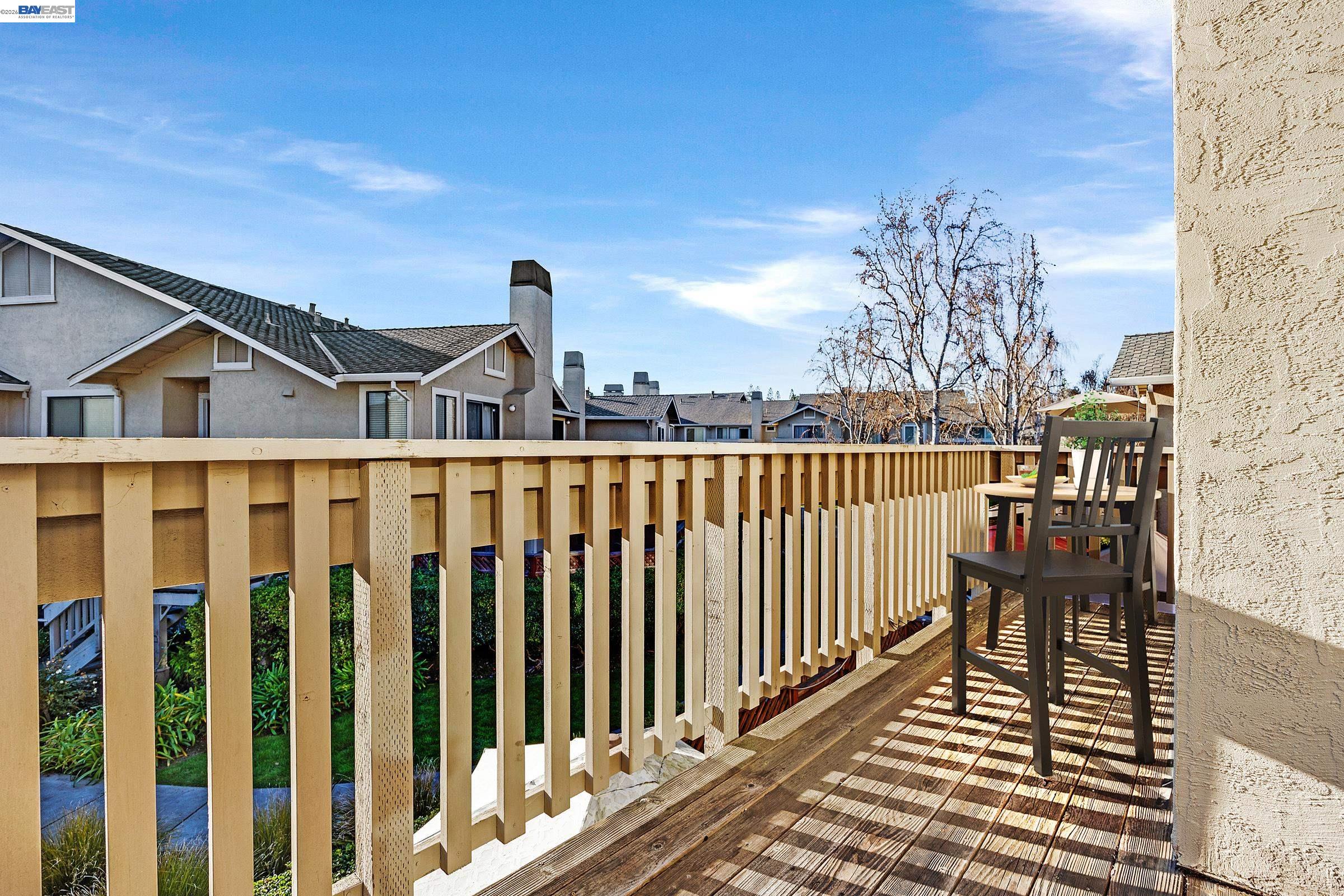 3769 Crow Canyon Road San Ramon, CA 94582 - Photo 46 of 56 a view of a balcony with wooden floor and fence