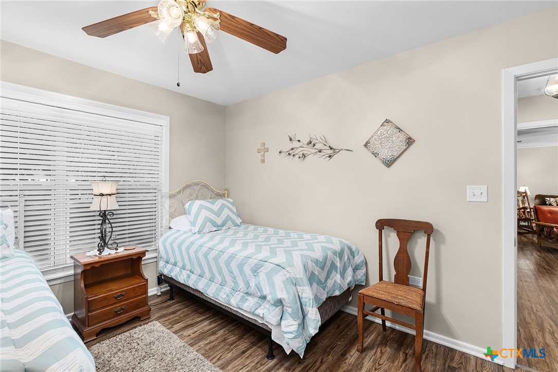 2052 Gruene Road New Braunfels, TX 78130 - Photo 23 of 33 a bedroom with bed and a window