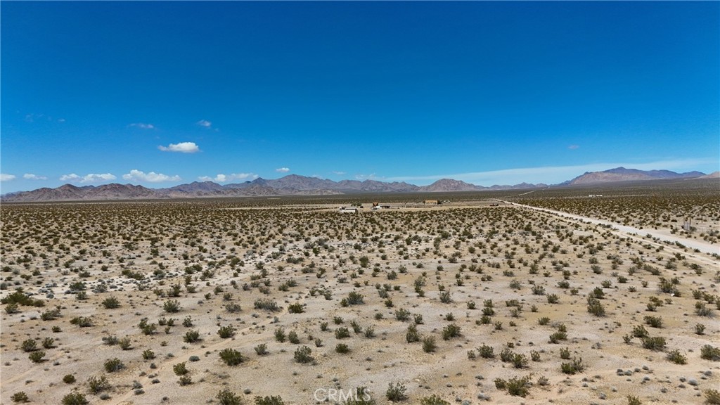 727 Harrod Road Lucerne Valley, CA 92356 - Photo 4 of 11 Red boundary lines on pictures are an estimate and for marketing purposes only. Buyer to verify all aspects of this property including, but not limited to utilities, assessments, boundaries, usage, access, and zoning to satisfy themselves.