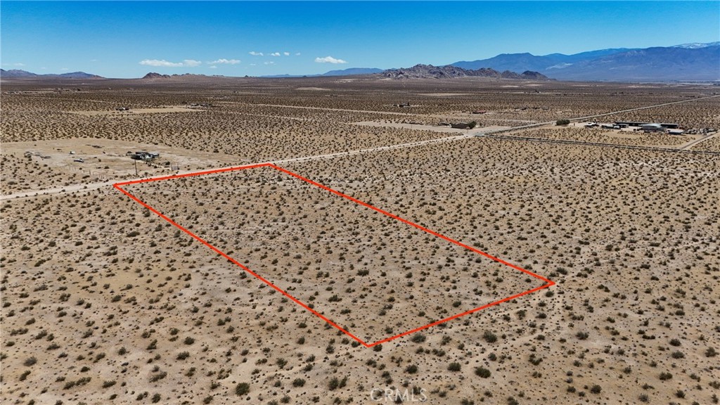 727 Harrod Road Lucerne Valley, CA 92356 - Photo 7 of 11 Red boundary lines on pictures are an estimate and for marketing purposes only. Buyer to verify all aspects of this property including, but not limited to utilities, assessments, boundaries, usage, access, and zoning to satisfy themselves.