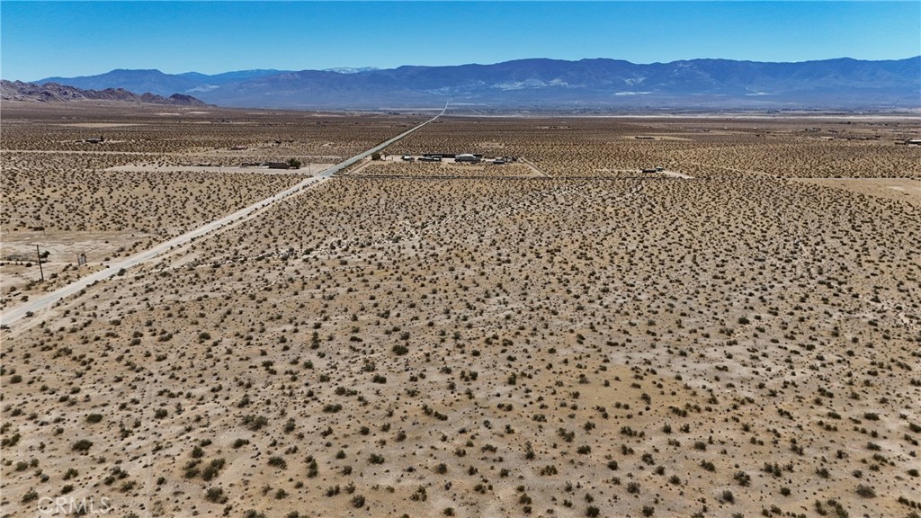 727 Harrod Road Lucerne Valley, CA 92356 - Photo 8 of 11 Red boundary lines on pictures are an estimate and for marketing purposes only. Buyer to verify all aspects of this property including, but not limited to utilities, assessments, boundaries, usage, access, and zoning to satisfy themselves.