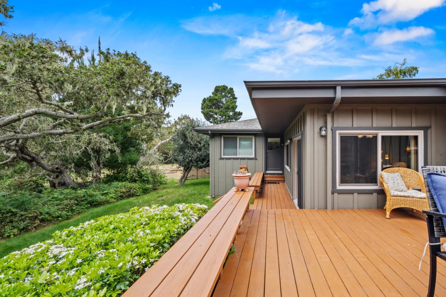 1088 Indian Village Road Pebble Beach, CA 93953 - Photo 13 of 22 a view of a balcony with two chairs and a table