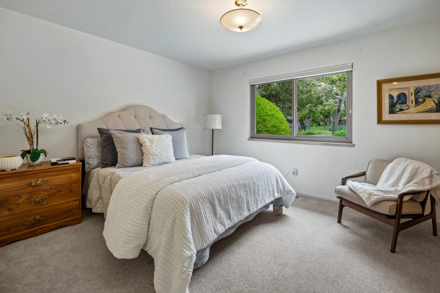 1088 Indian Village Road Pebble Beach, CA 93953 - Photo 17 of 22 a bedroom with a bed and a window