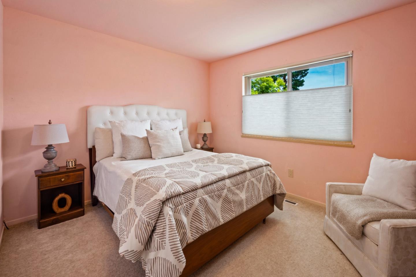 1088 Indian Village Road Pebble Beach, CA 93953 - Photo 18 of 22 a bedroom with a bed and a couch
