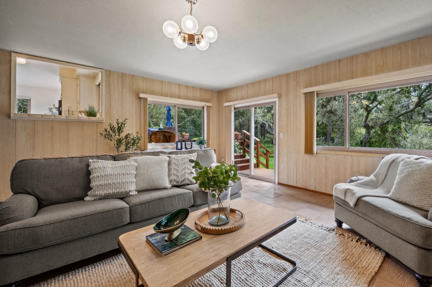1088 Indian Village Road Pebble Beach, CA 93953 - Photo 2 of 22 a living room with furniture and a large window