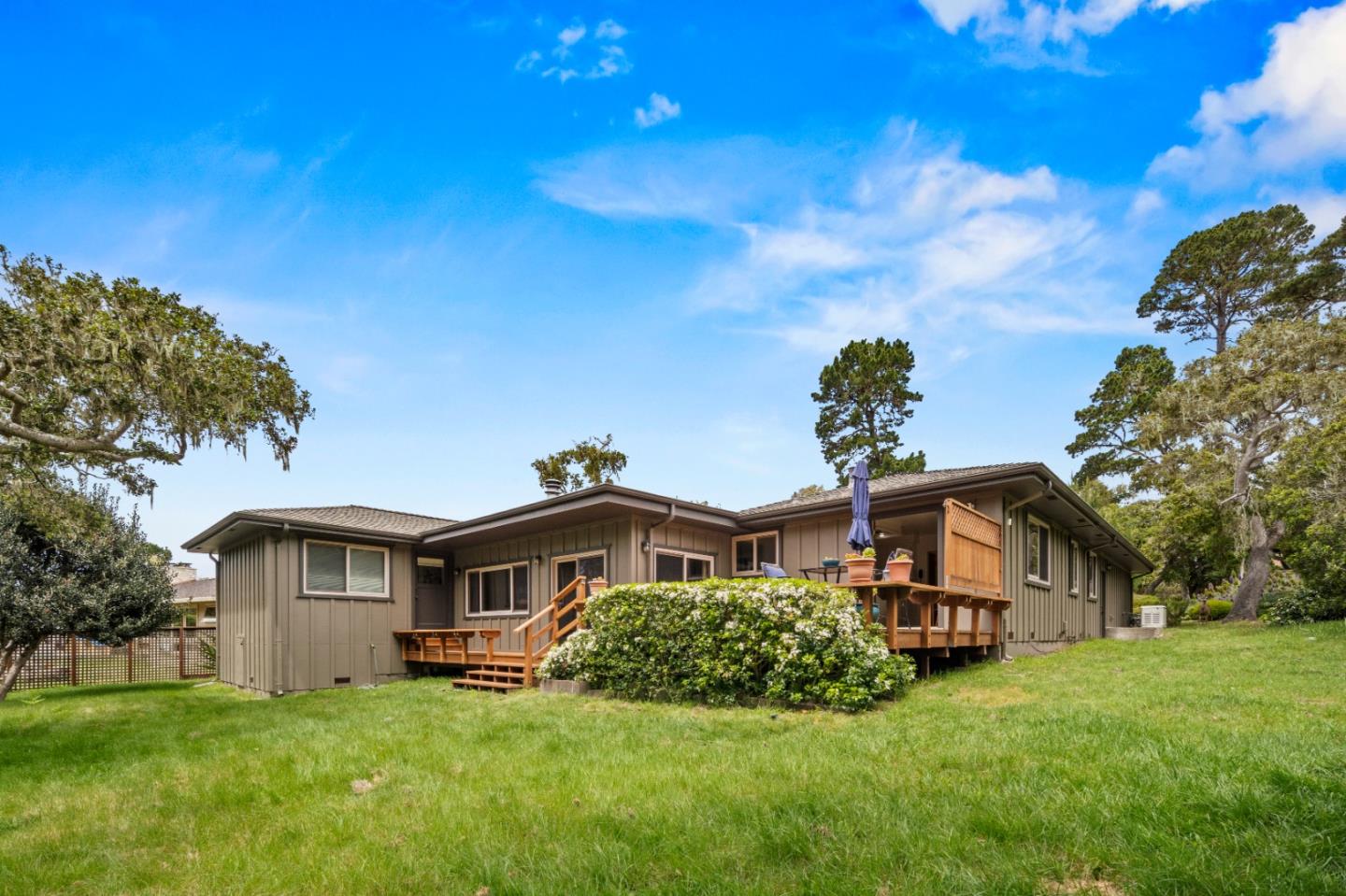 1088 Indian Village Road Pebble Beach, CA 93953 - Photo 21 of 22 a front view of a house with a yard