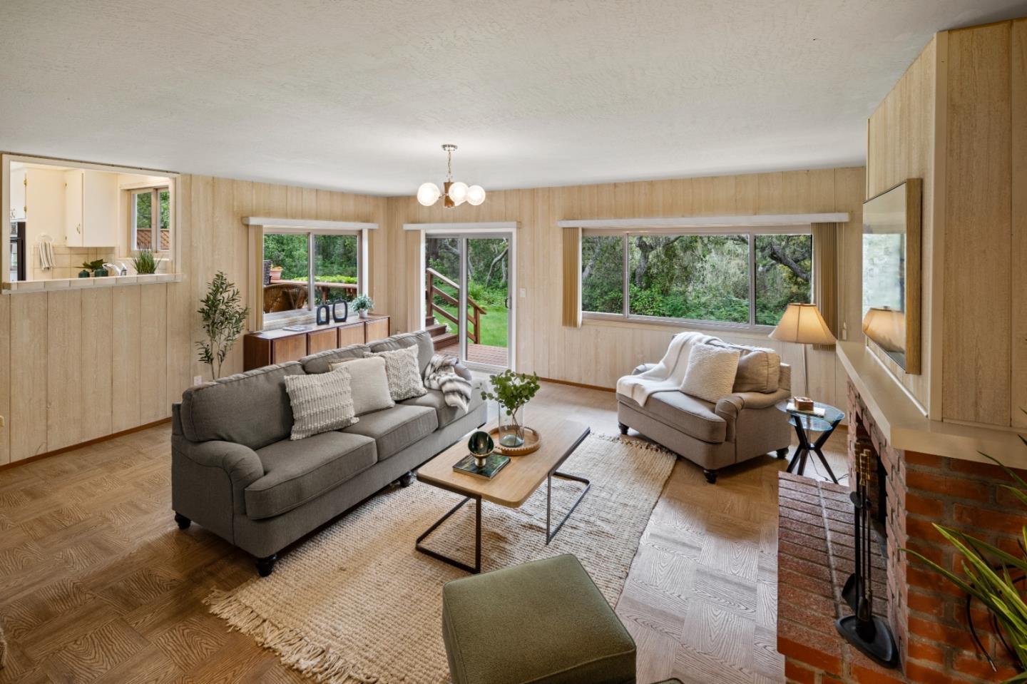 1088 Indian Village Road Pebble Beach, CA 93953 - Photo 3 of 22 a living room with furniture and large windows