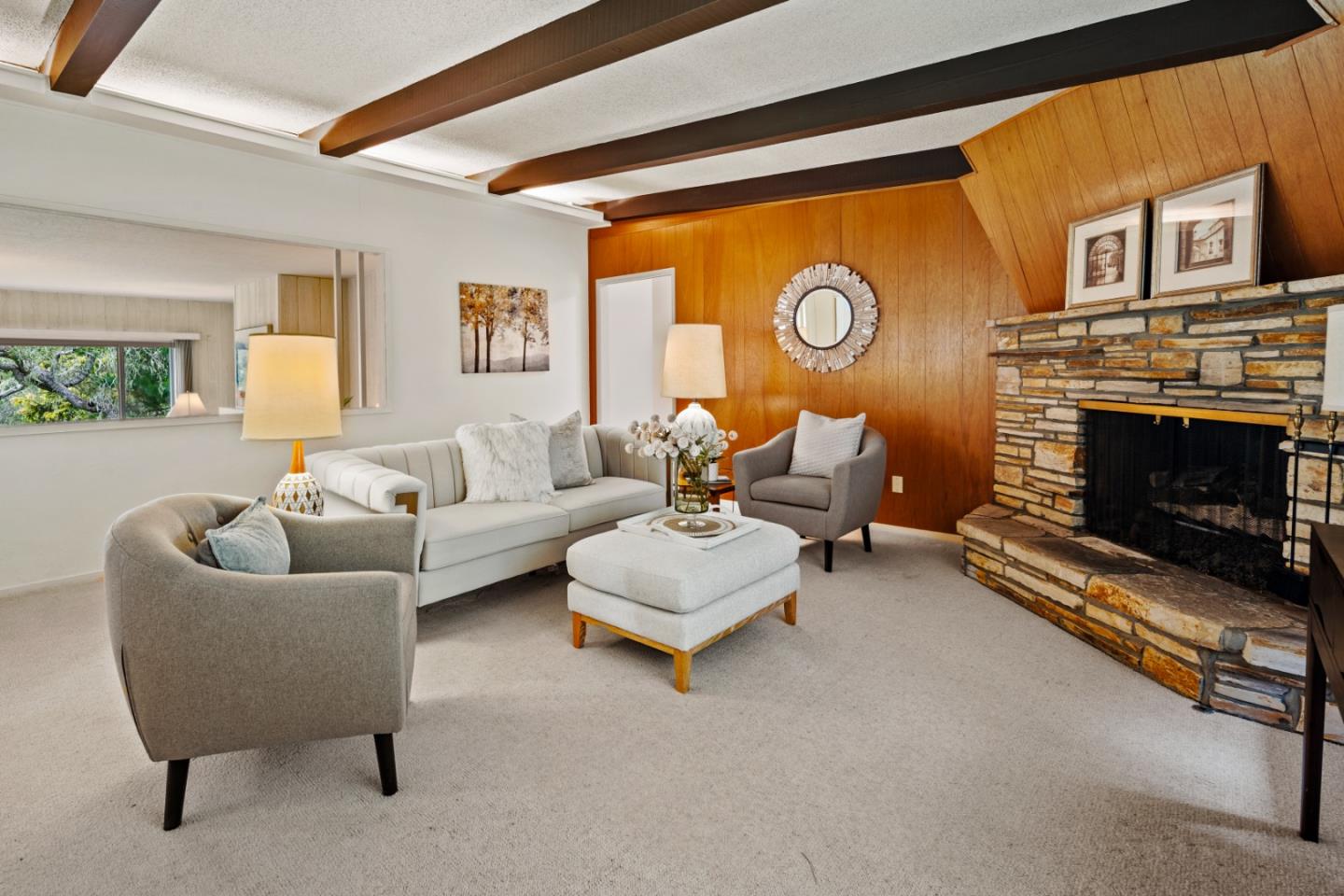 1088 Indian Village Road Pebble Beach, CA 93953 - Photo 5 of 22 a living room with furniture and a fireplace