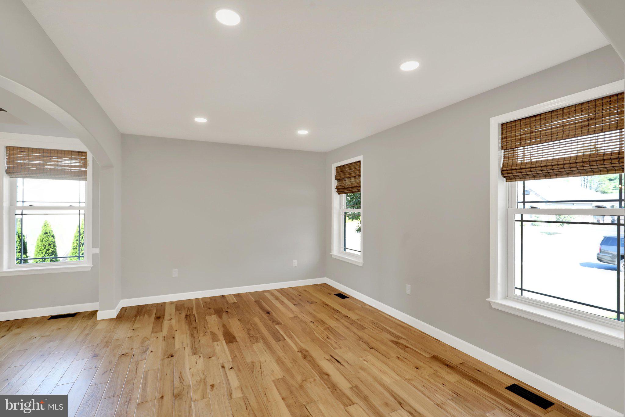 64 Middletown Road Fleetwood, PA 19522 - Photo 5 of 54 an empty room with wooden floor and windows