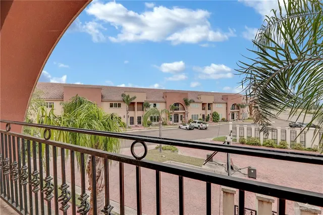 a view of balcony with furniture
