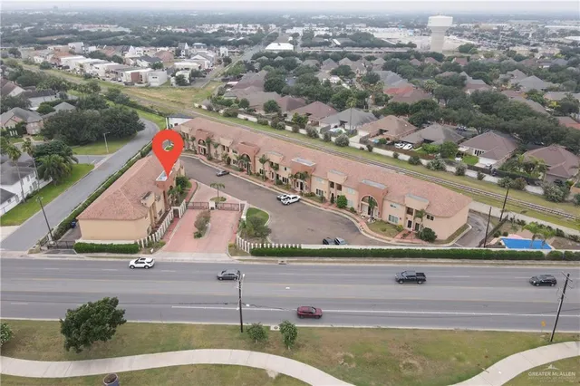 an aerial view of a house with a garden