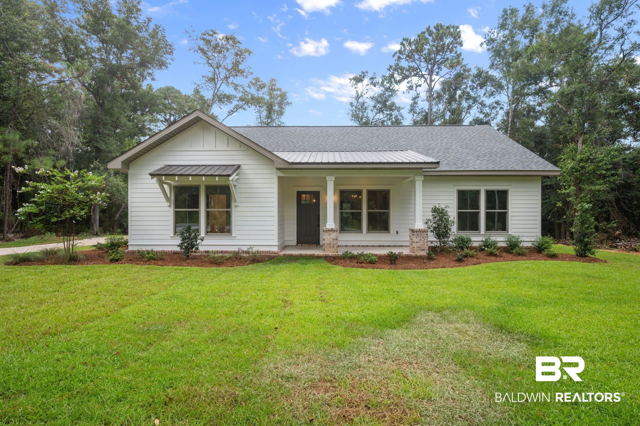 12412 Mannich Lane Foley, AL 36535 - Photo 1 of 23 View of front of property with a front lawn