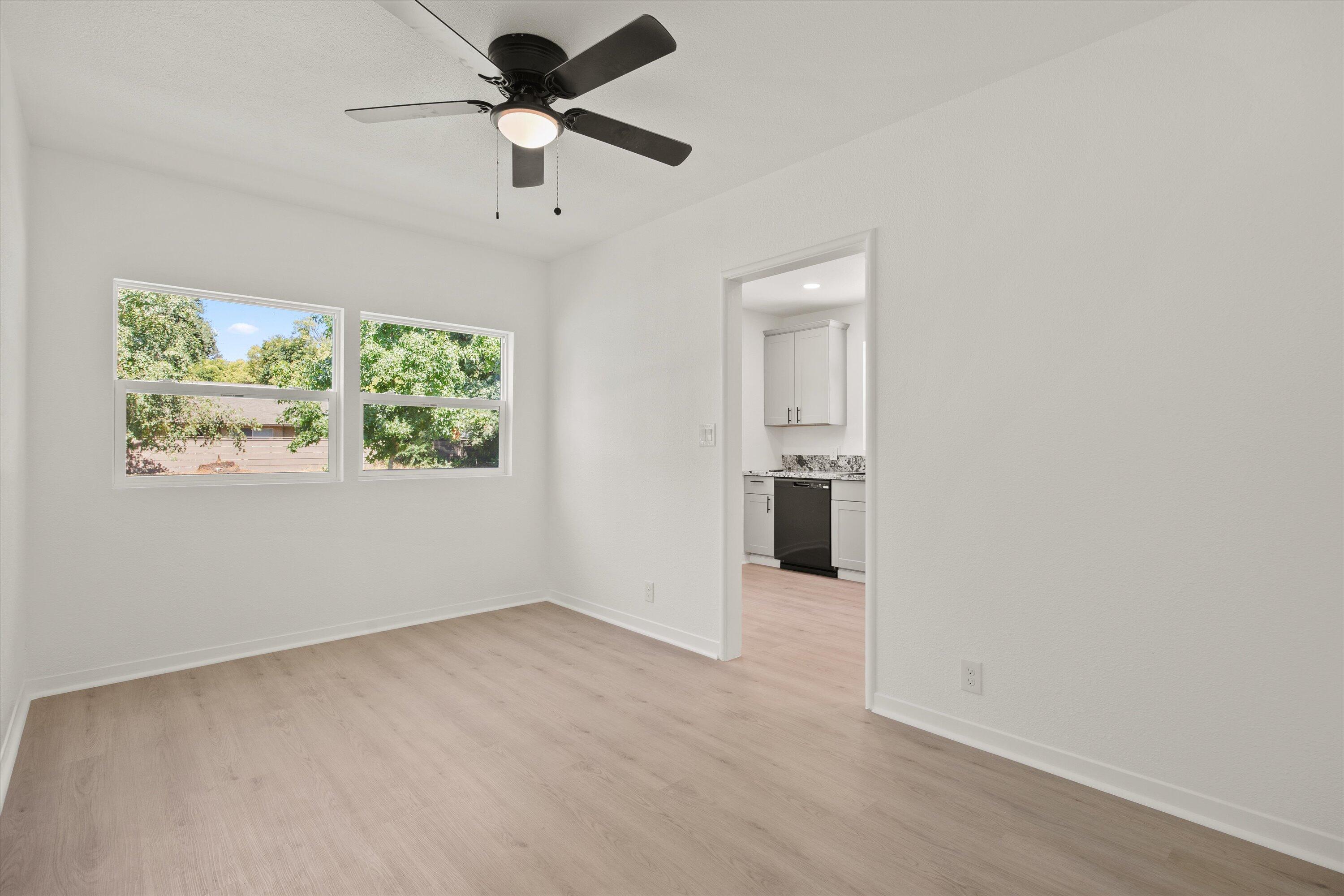 1709 Arcadian Avenue Chico, CA 95926 - Photo 14 of 33 an empty room with fan and windows