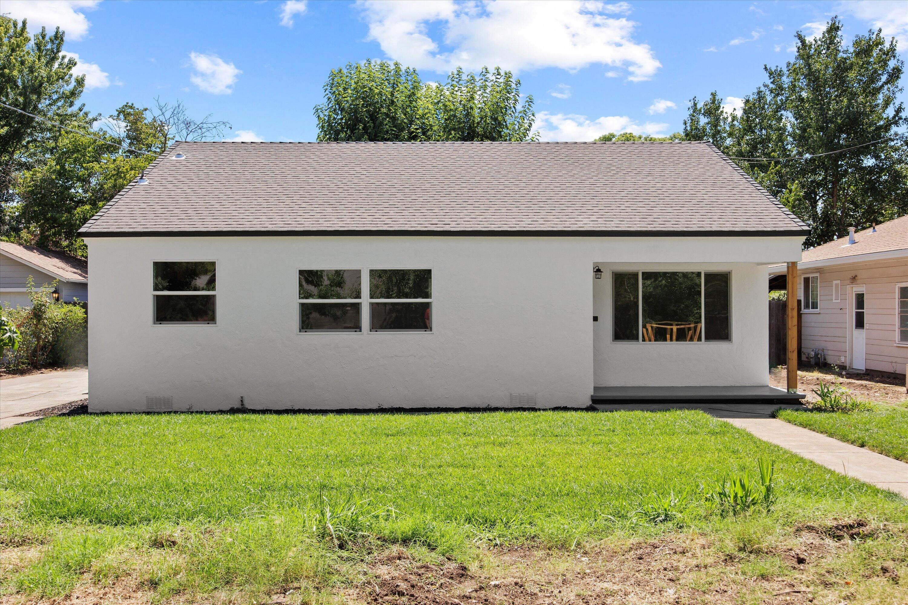 1709 Arcadian Avenue Chico, CA 95926 - Photo 5 of 33 a house view with a garden space