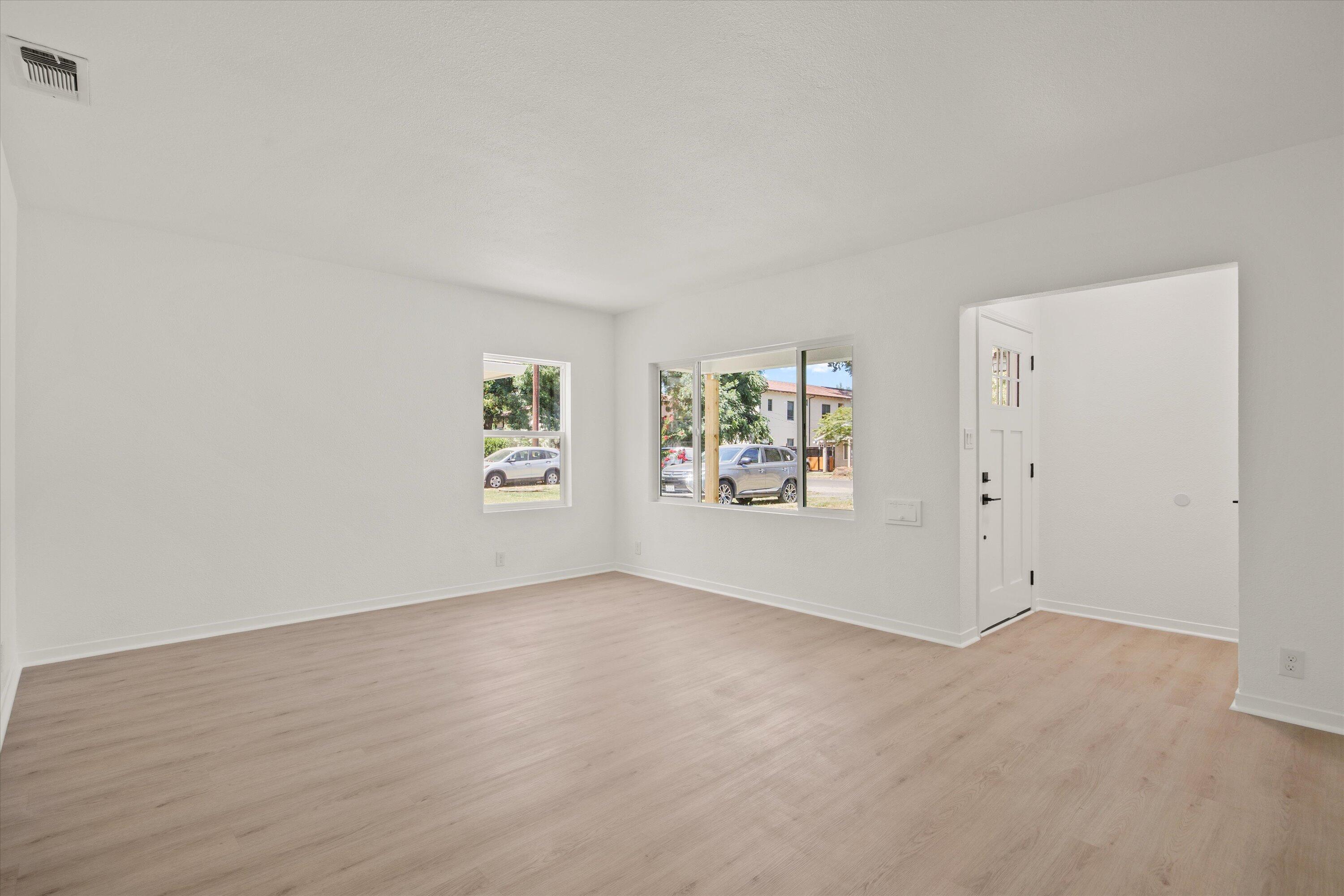 1709 Arcadian Avenue Chico, CA 95926 - Photo 10 of 33 an empty room with painting and windows