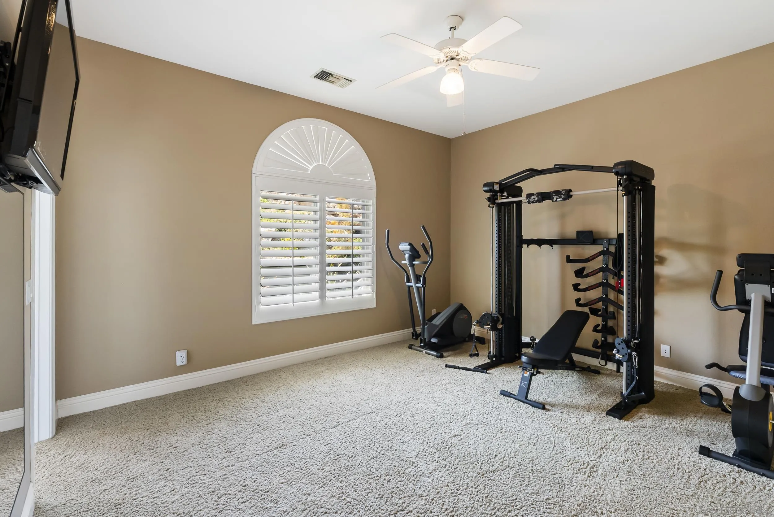 14998 Budwin Lane Poway, CA 92064 - Photo 31 of 44 a view of a room with gym equipment