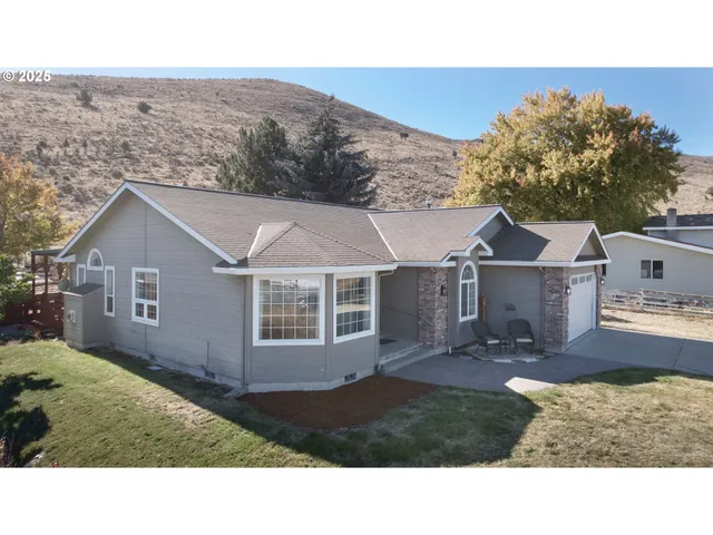 a house view with a garden space