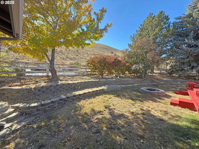 a view of a yard with an outdoor space