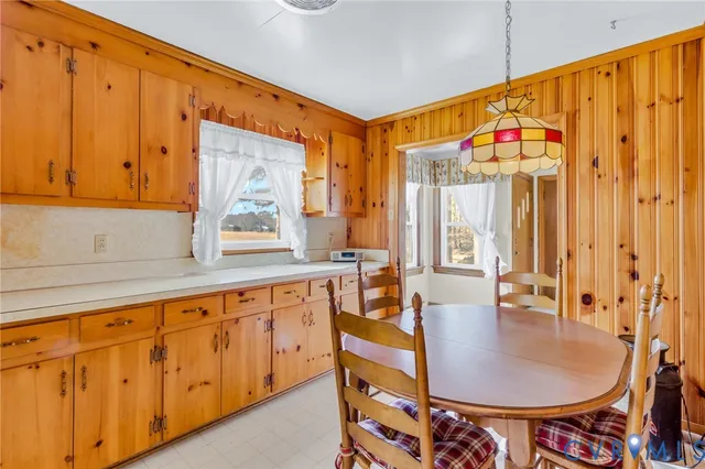 a kitchen with stainless steel appliances granite countertop a sink and cabinets
