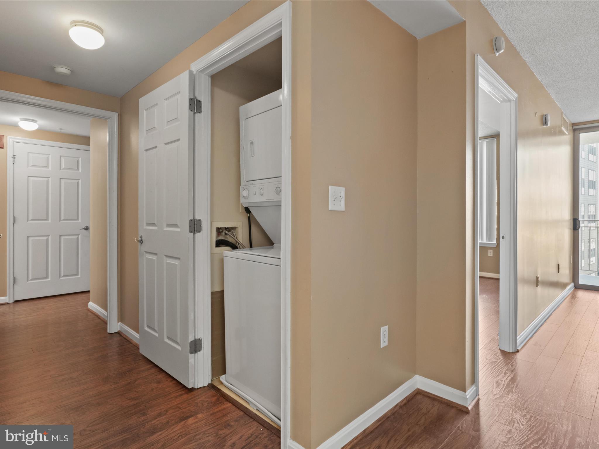 2726 Gallows Road, Unit 411 Vienna, VA 22180 - Photo 14 of 36 a view of a hallway with wooden floor