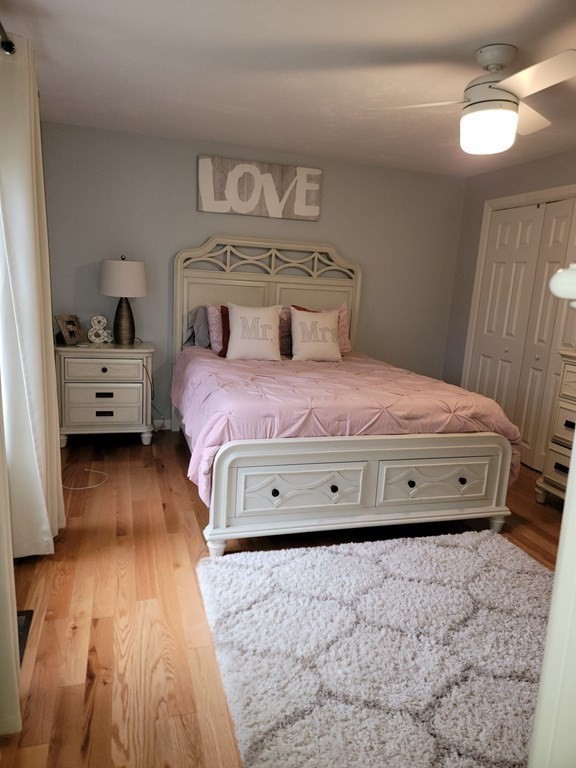 66 Vincent Circle Worcester, MA 01604 - Photo 14 of 40 a bedroom with a bed and a chandelier