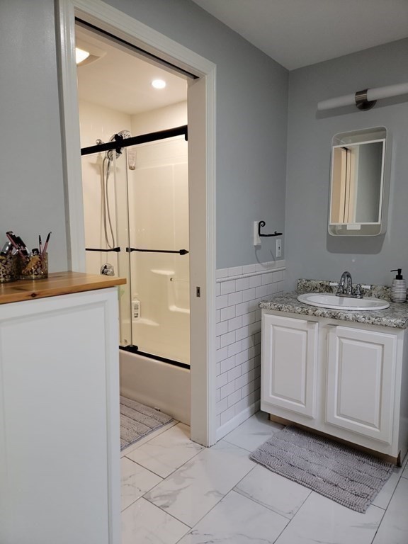 66 Vincent Circle Worcester, MA 01604 - Photo 19 of 40 a room with a refrigerator and a stove