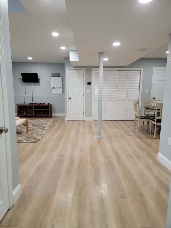 66 Vincent Circle Worcester, MA 01604 - Photo 23 of 40 a view of dining room with kitchen island stainless steel appliances refrigerator stove microwave and cabinets