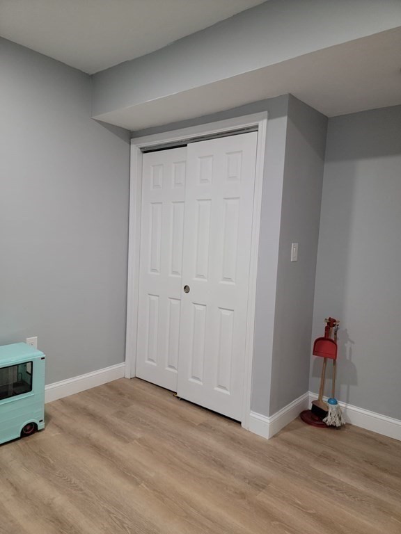 66 Vincent Circle Worcester, MA 01604 - Photo 26 of 40 a view of empty room with wooden floor