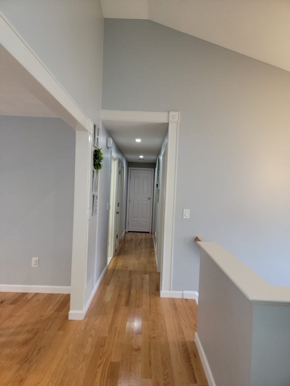 66 Vincent Circle Worcester, MA 01604 - Photo 7 of 40 a view of hallway with wooden floor