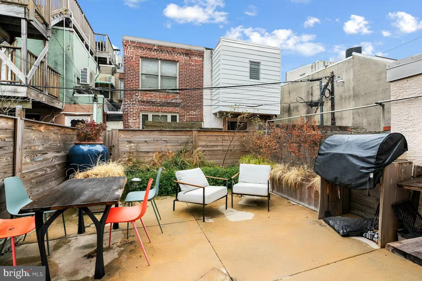 936 Tasker Street Philadelphia, PA 19148 - Photo 17 of 17 a view of a patio with couches table and chairs