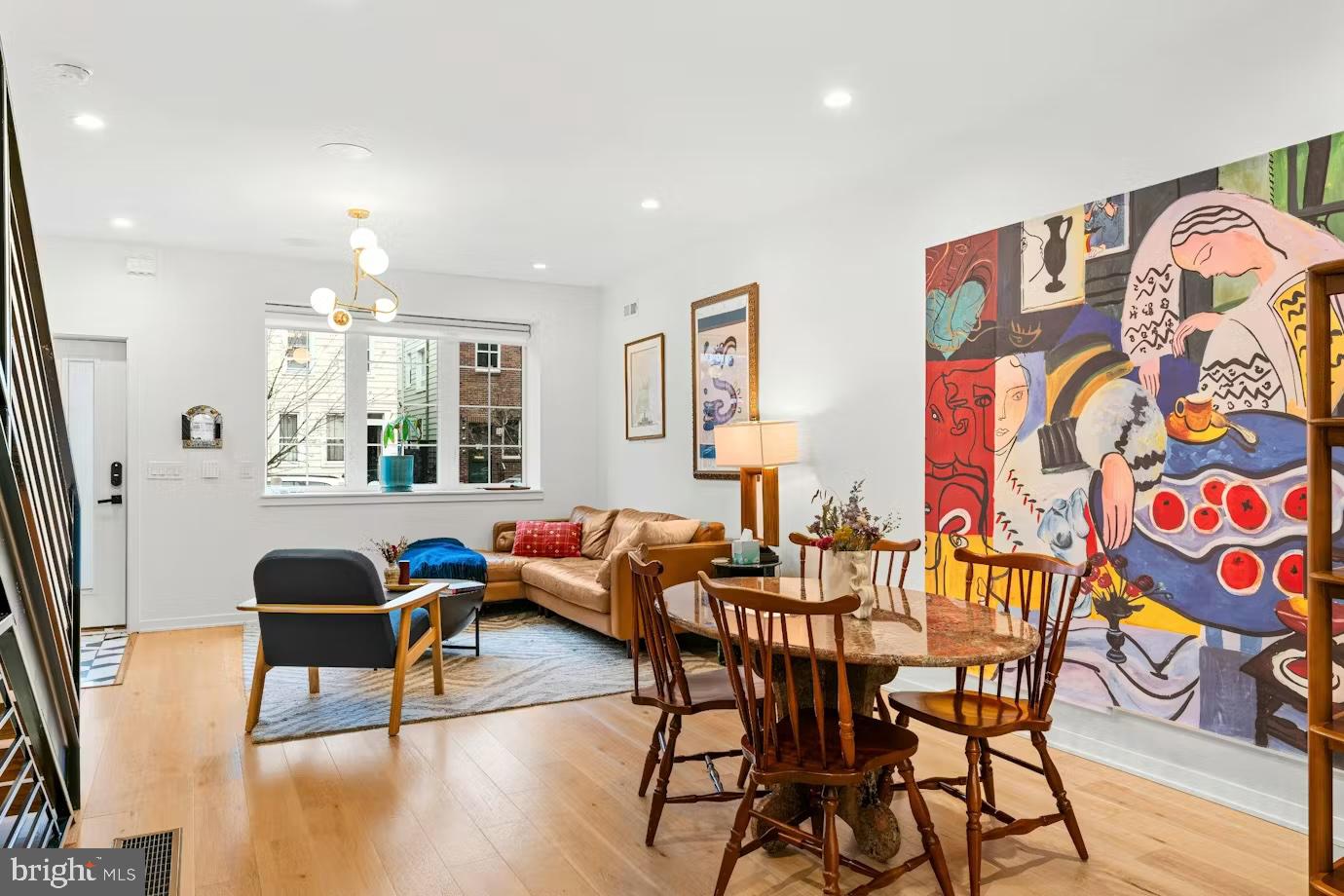 936 Tasker Street Philadelphia, PA 19148 - Photo 2 of 17 a dining room with furniture and wooden floor