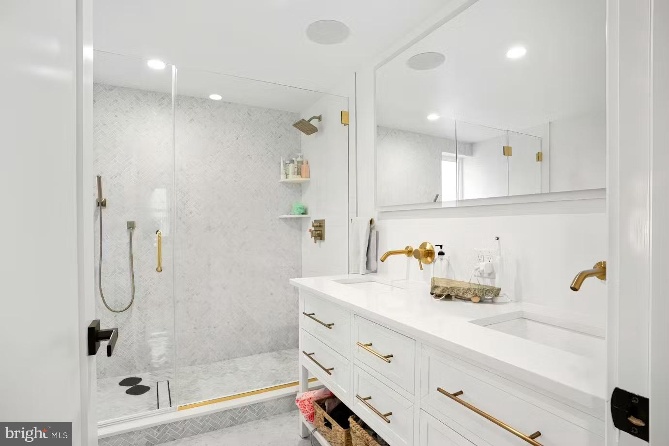 936 Tasker Street Philadelphia, PA 19148 - Photo 8 of 17 a bathroom with a shower sink and mirror