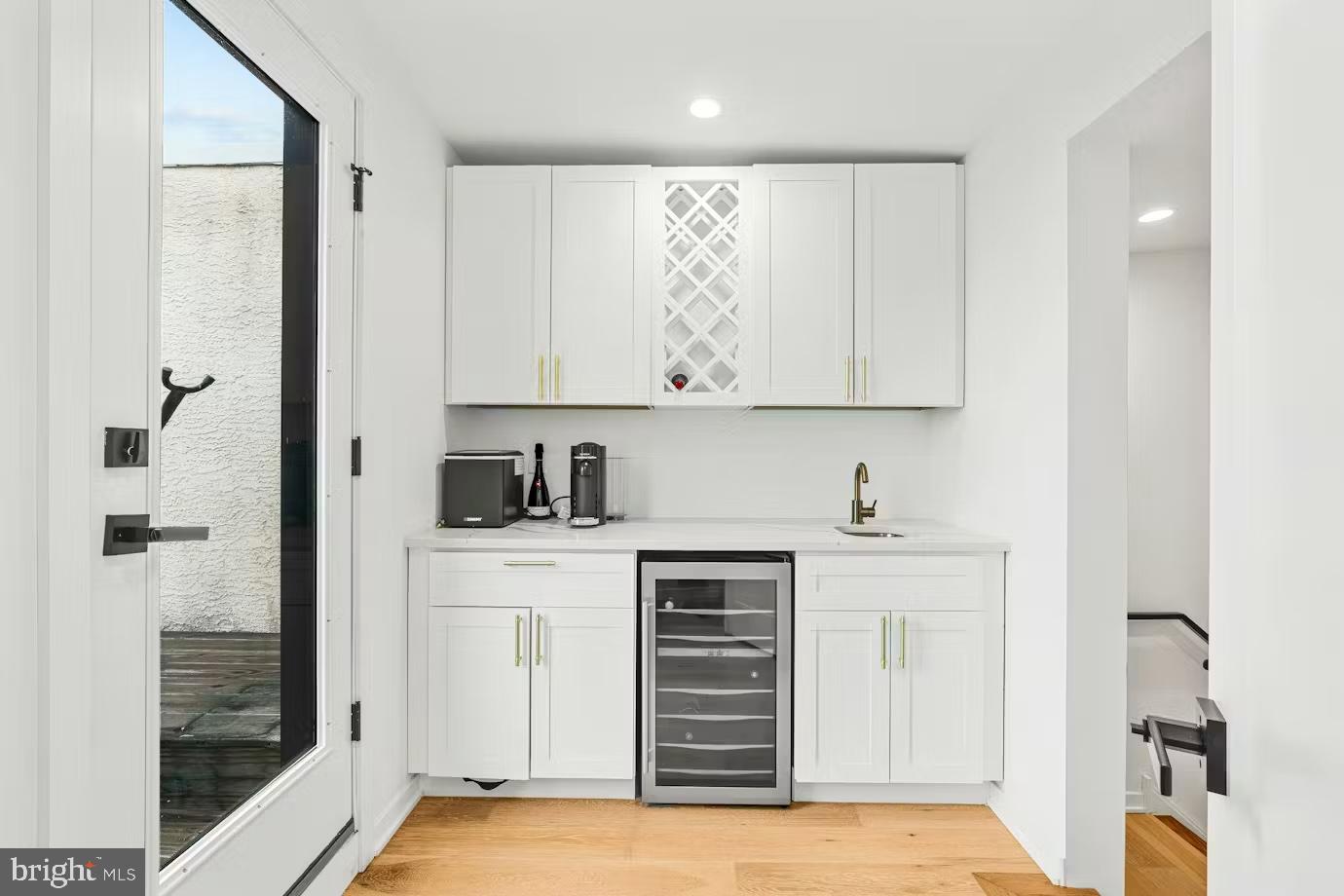 936 Tasker Street Philadelphia, PA 19148 - Photo 10 of 17 a view of a kitchen with electric appliances