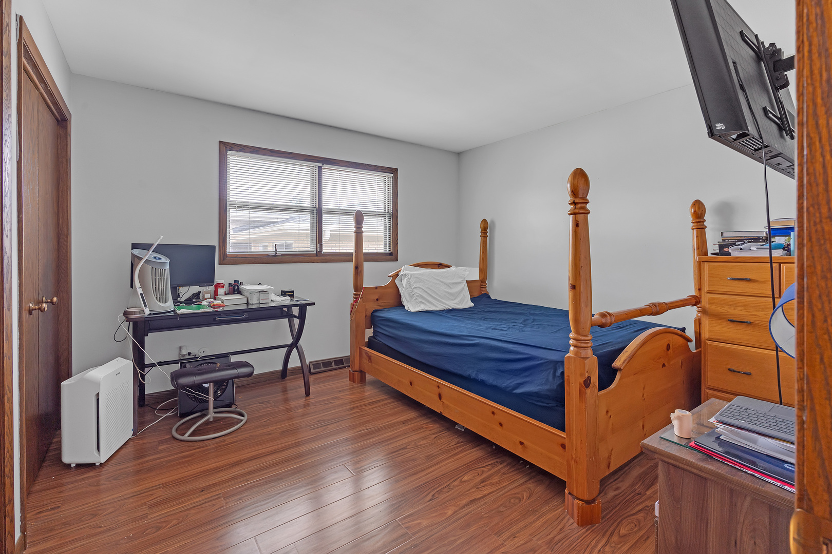 11020 Raleigh Street Westchester, IL 60154 - Photo 19 of 27 a bed room with furniture and a window