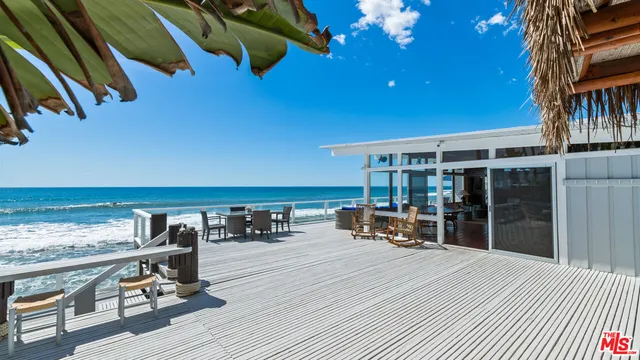 a view of a terrace with seating area