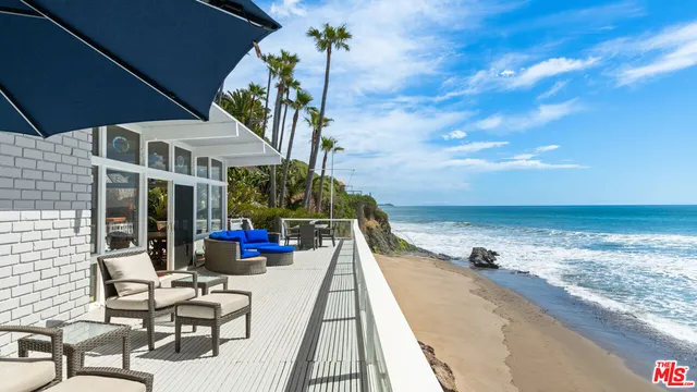 a view of a garden with a patio