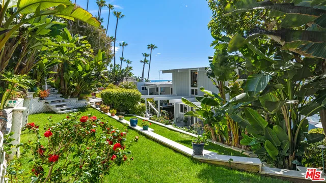 a view of a house with a snow yard