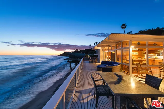 a view of a terrace with chairs