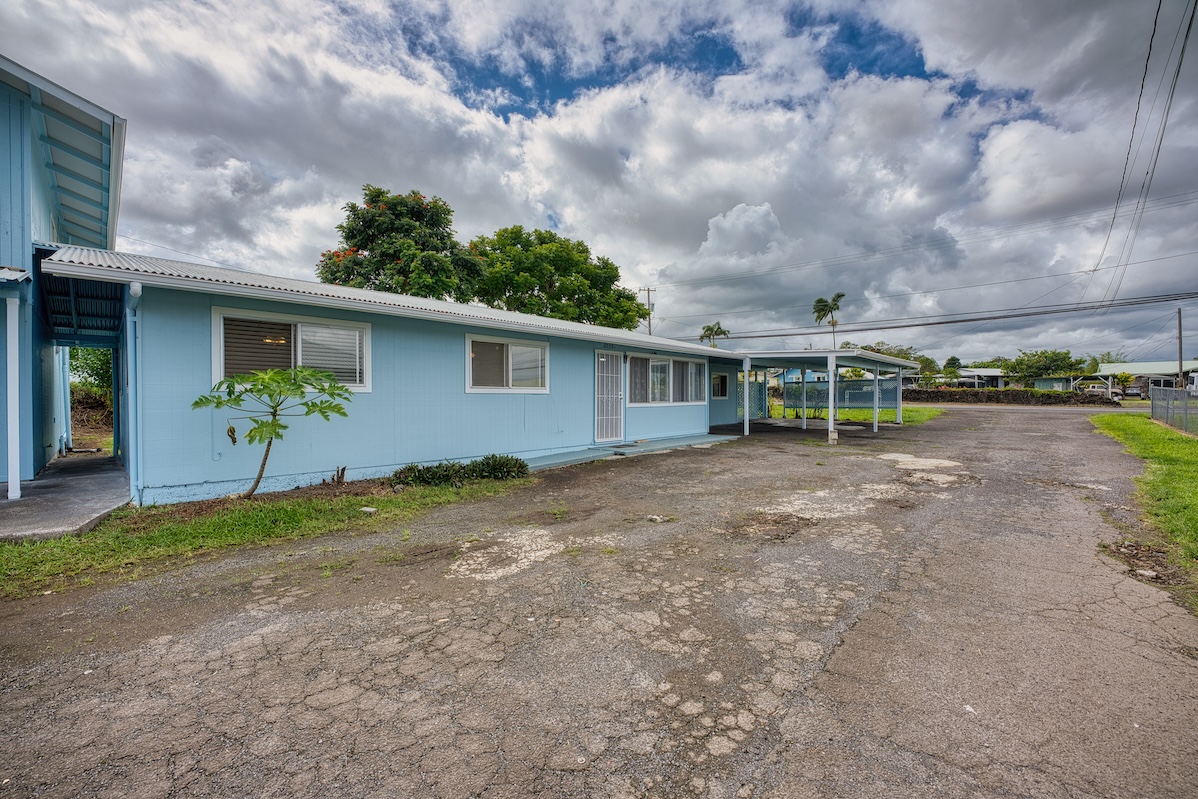 2059 Kinoole Street Hilo, HI 96720 - Photo 25 of 30 a view of a house with backyard and a garden