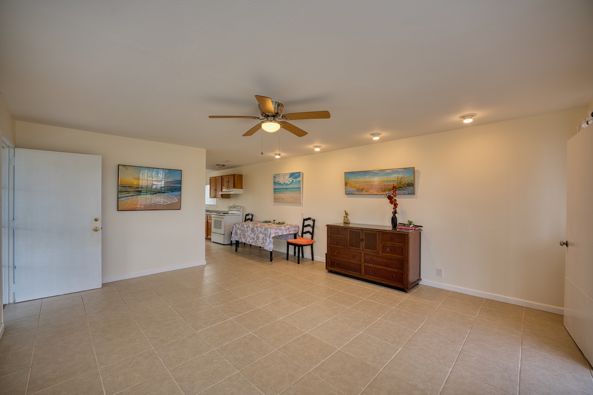 2059 Kinoole Street Hilo, HI 96720 - Photo 3 of 30 a view of a livingroom with furniture and a ceiling fan