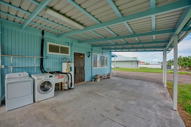 a view of a house with a garage