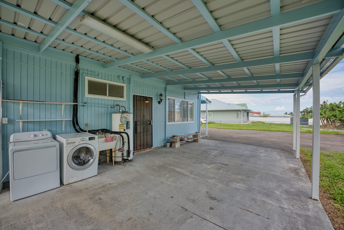 2059 Kinoole Street Hilo, HI 96720 - Photo 6 of 30 a view of a house with a garage