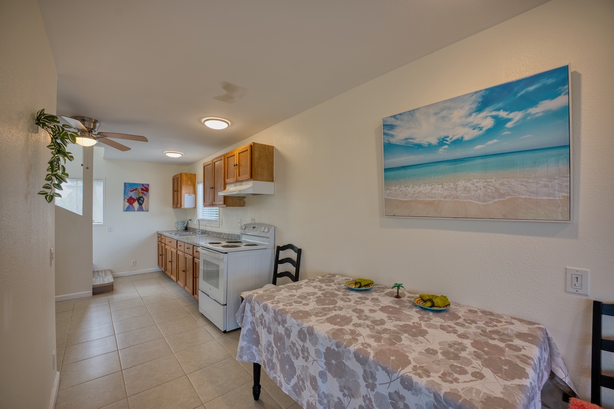 2059 Kinoole Street Hilo, HI 96720 - Photo 7 of 30 a kitchen that has a lot of cabinets in it