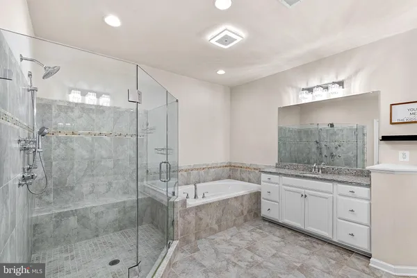 a bedroom with a bed and a table